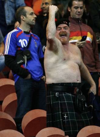 a scotland fan  r  celebrates